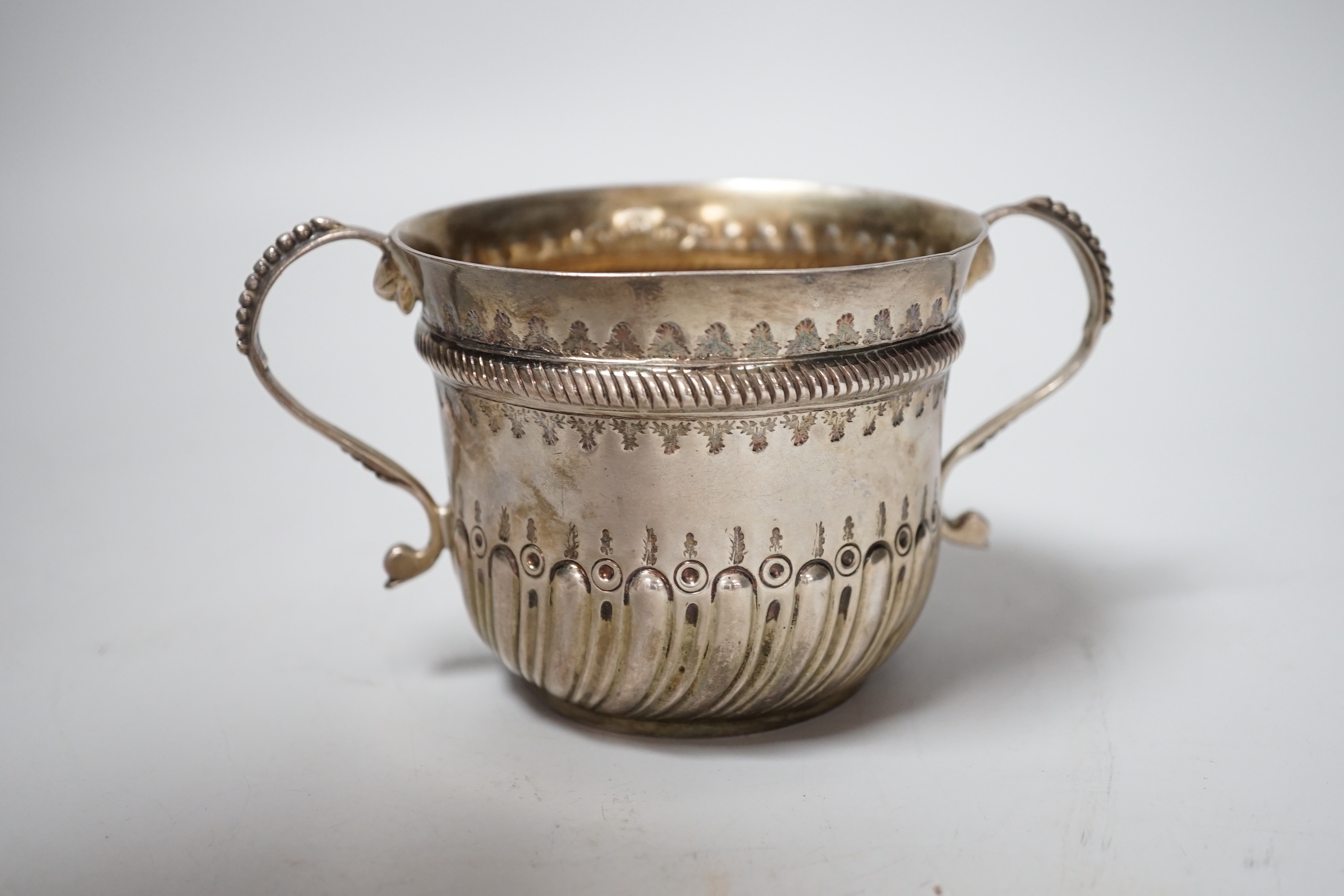 A late Victorian embossed silver porringer, London, 1896, 81mm, 5.3oz.